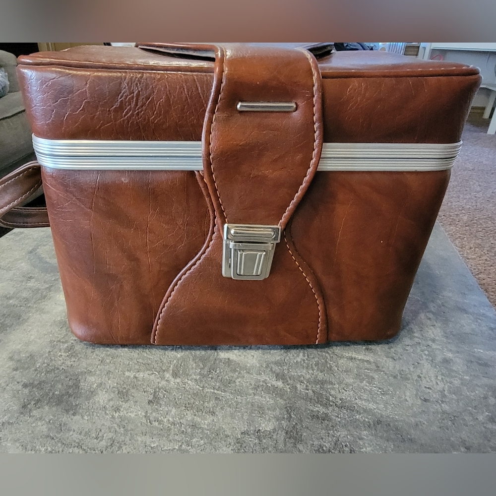Vintage hardside leather camera case with strap
